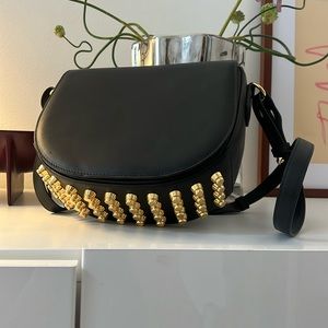 Alexander Wang black bag with gold studded details